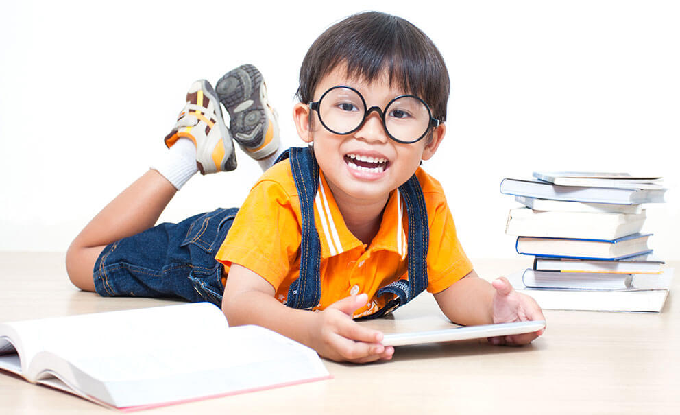boy with books and tablet
